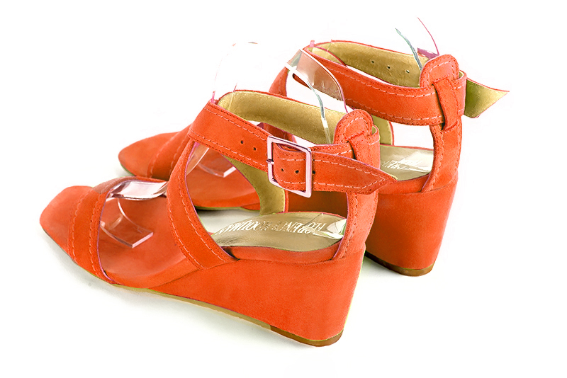 Clementine orange women's fully open sandals, with crossed straps. Square toe. Medium wedge heels. Rear view - Florence KOOIJMAN